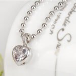 Elegant Platinum-Plated Heart Pendant Necklace and Earrings Set with Cubic Zirconia