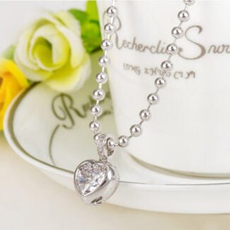 Elegant Platinum-Plated Heart Pendant Necklace and Earrings Set with Cubic Zirconia